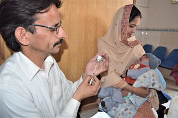 Polio vaccination to child